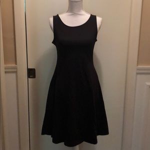 A-Line dress with side pockets.